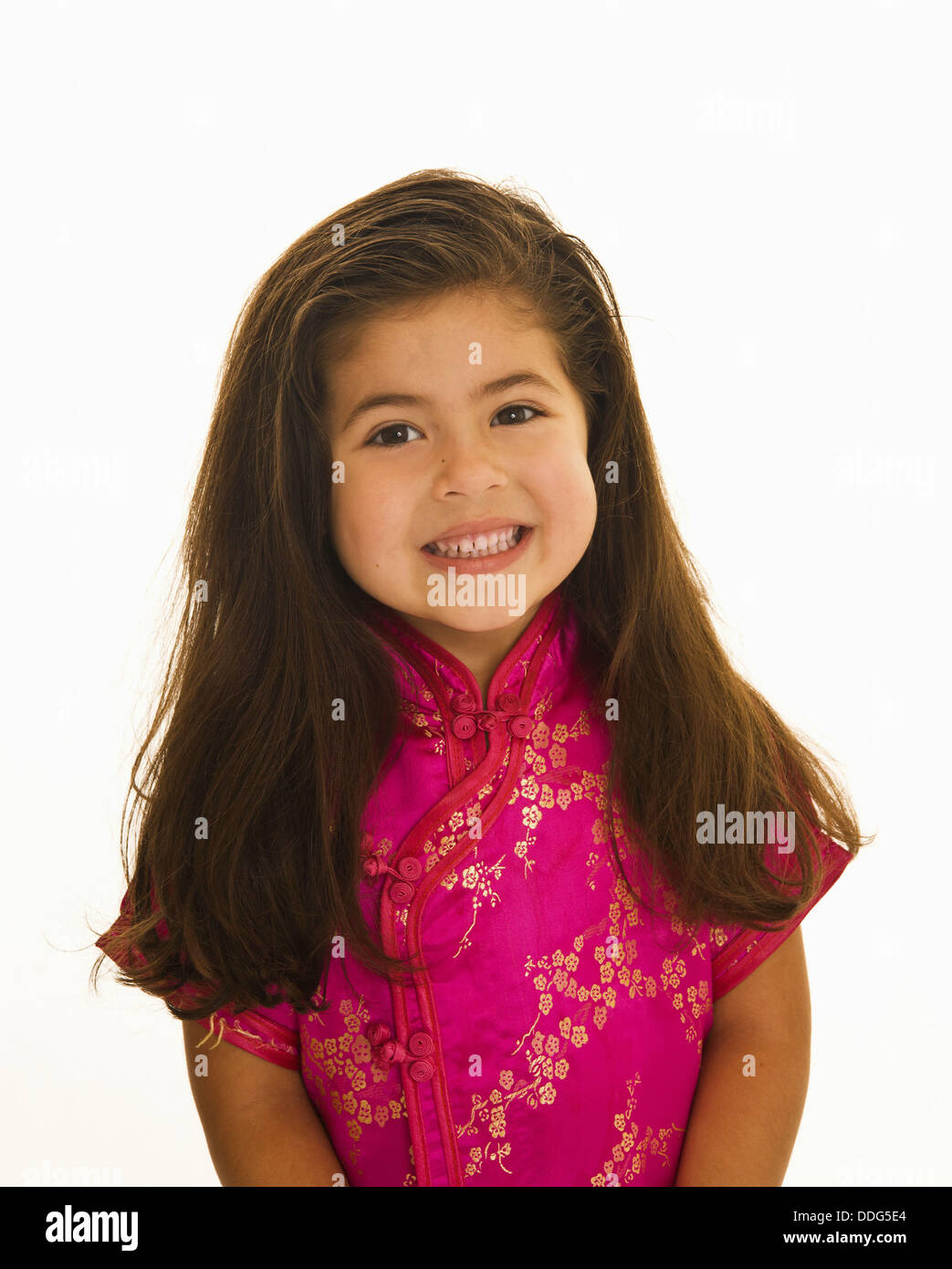 Four Year Old Girl With Long Brown Hair In Pink Decorative Top
