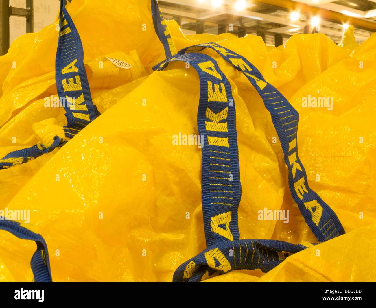 Bright Yellow and Blue Reuseable Shopping bags, IKEA Swedish Retail Store Interior, Stoughton, NA Stock Photo