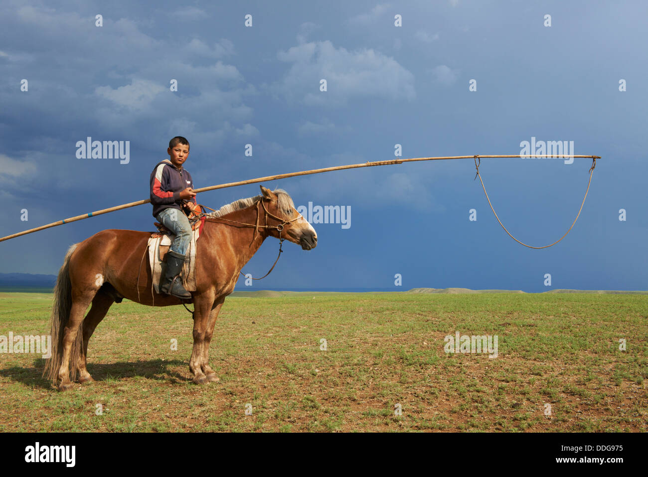Mongolia, Tov province, nomad, horseman with urga Stock Photo
