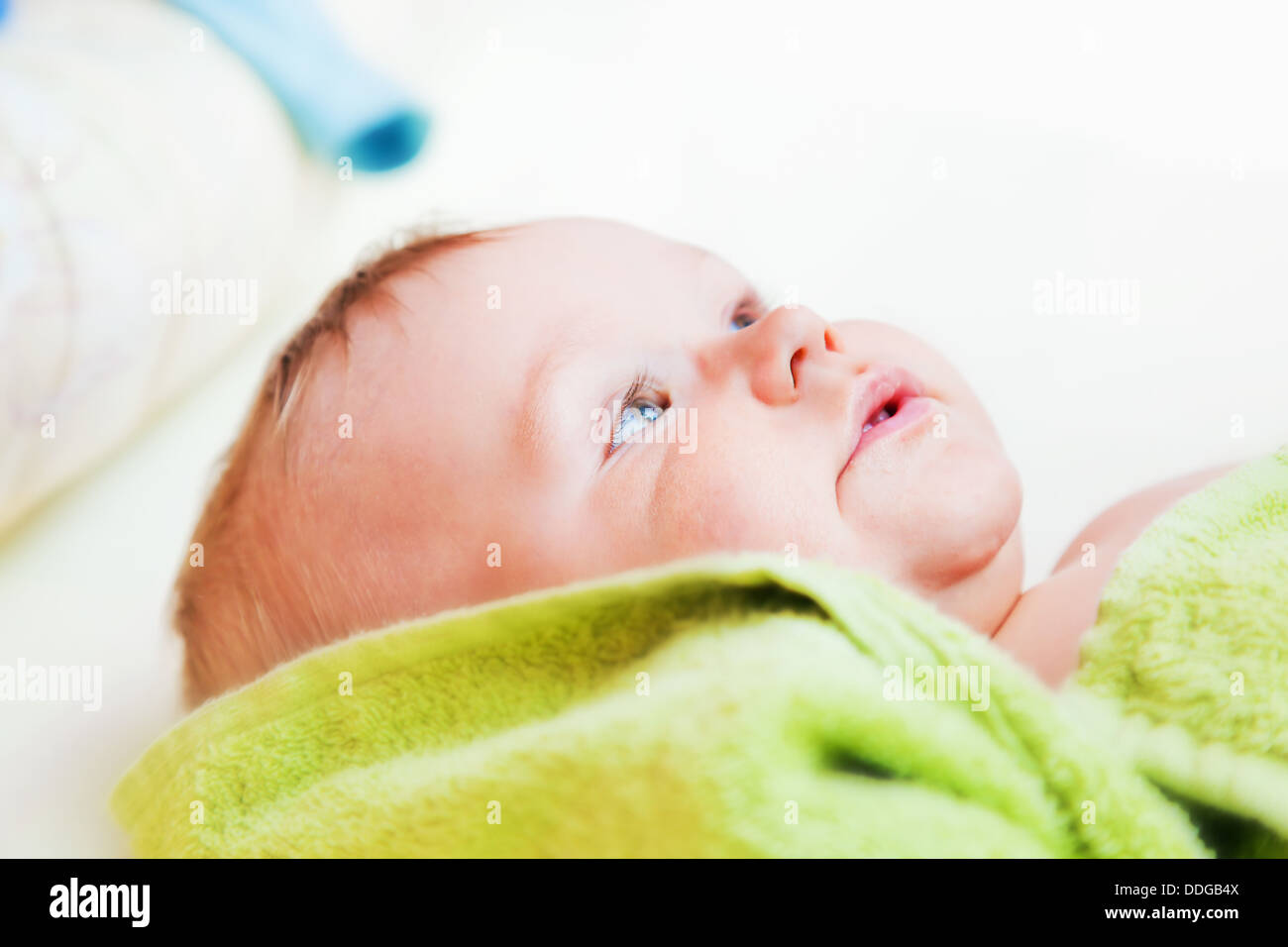 A baby waiting for his nappy change Stock Photo