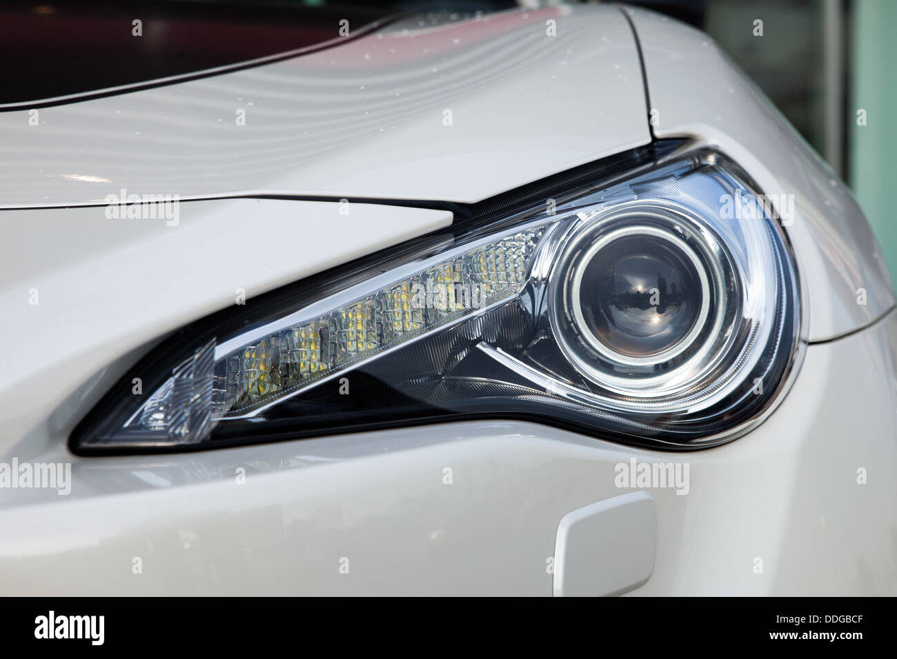 Front light of a modern sports car, including several LED elements
