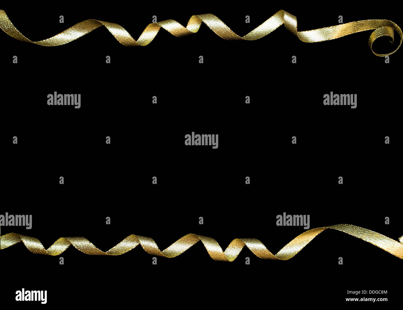 Gold curly ribbons Stock Photo