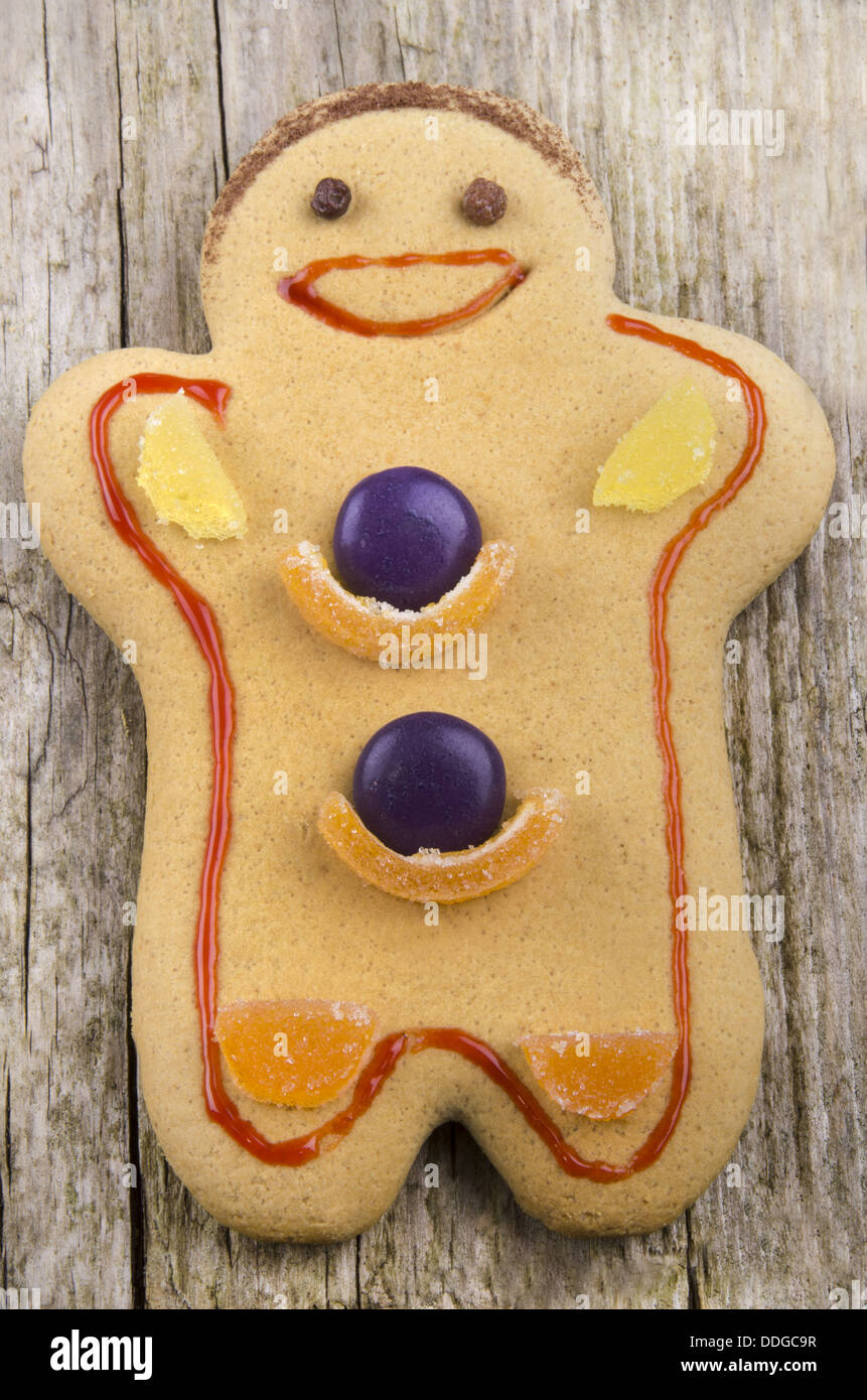 ginger bread man on a timber board Stock Photo