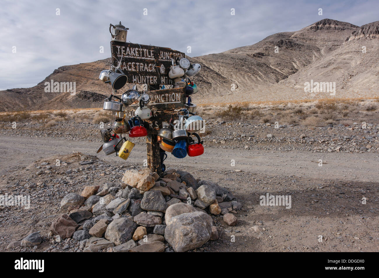 Tea pots and kettles hung onto Teakettle Junction, Race Track Valley Road, Death Valley National
