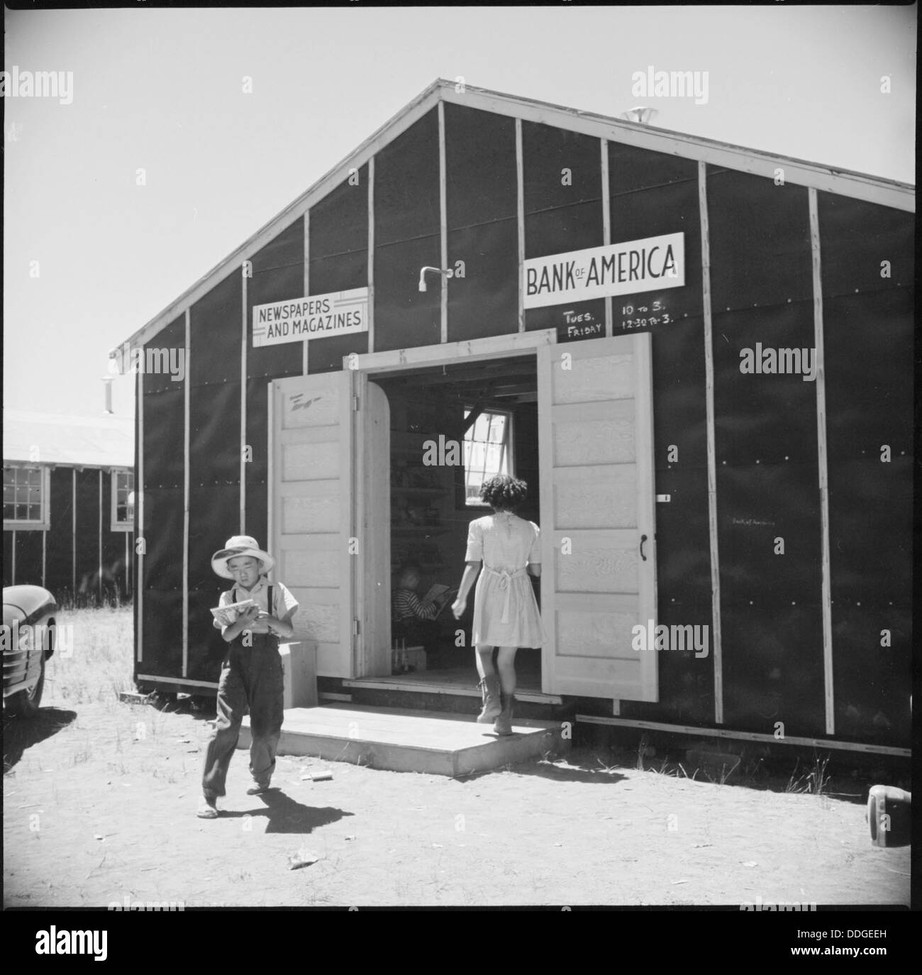 Tule Lake Relocation Center, Newell, California. A view of the bank and newsstand at this War Reloc . . . 538244 Stock Photo