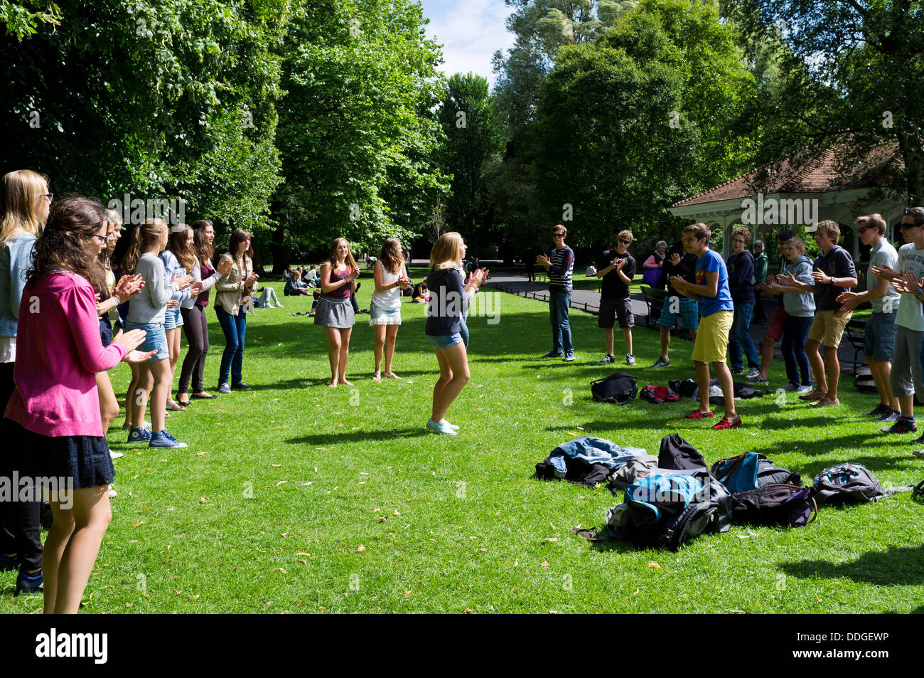 Younth practicing a dance routine on a lawn in St Stephens Green, Dublin, Ireland Stock Photo