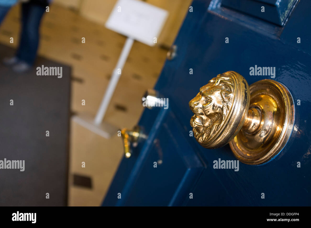 Brass lions head doorknob at the entrance to the State apartments in Dublin Castle, Ireland. Stock Photo