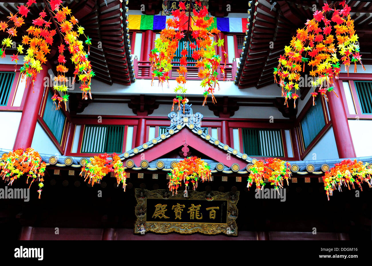 The Buddha Tooth Relic Temple decorated with artificial flowers Stock Photo