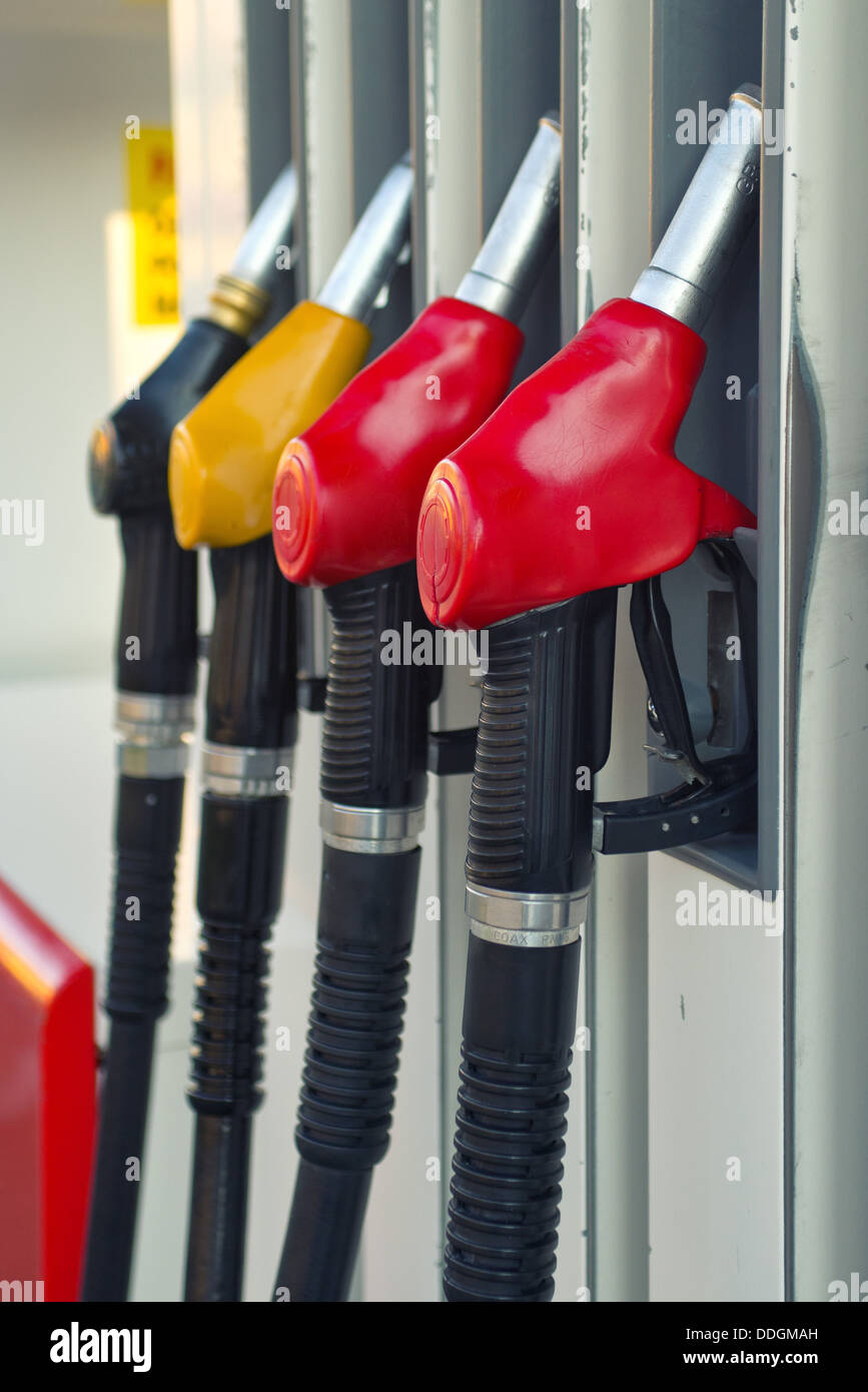Pump nozzles at the gas pump station. Stock Photo