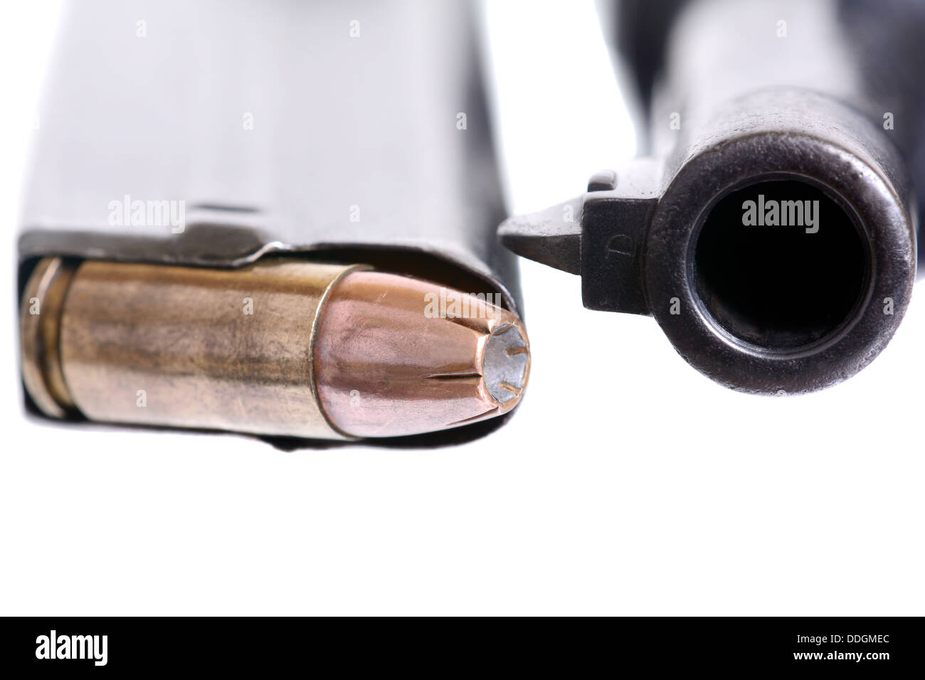Macro shot of 9mm bullets and a Luger gun barrel Stock Photo