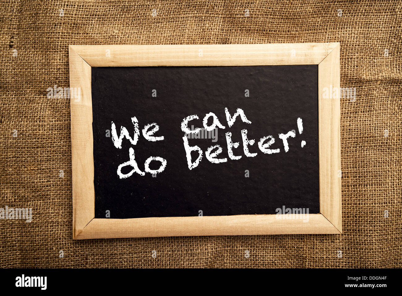 We can do better, motivational message on blackboard. Stock Photo