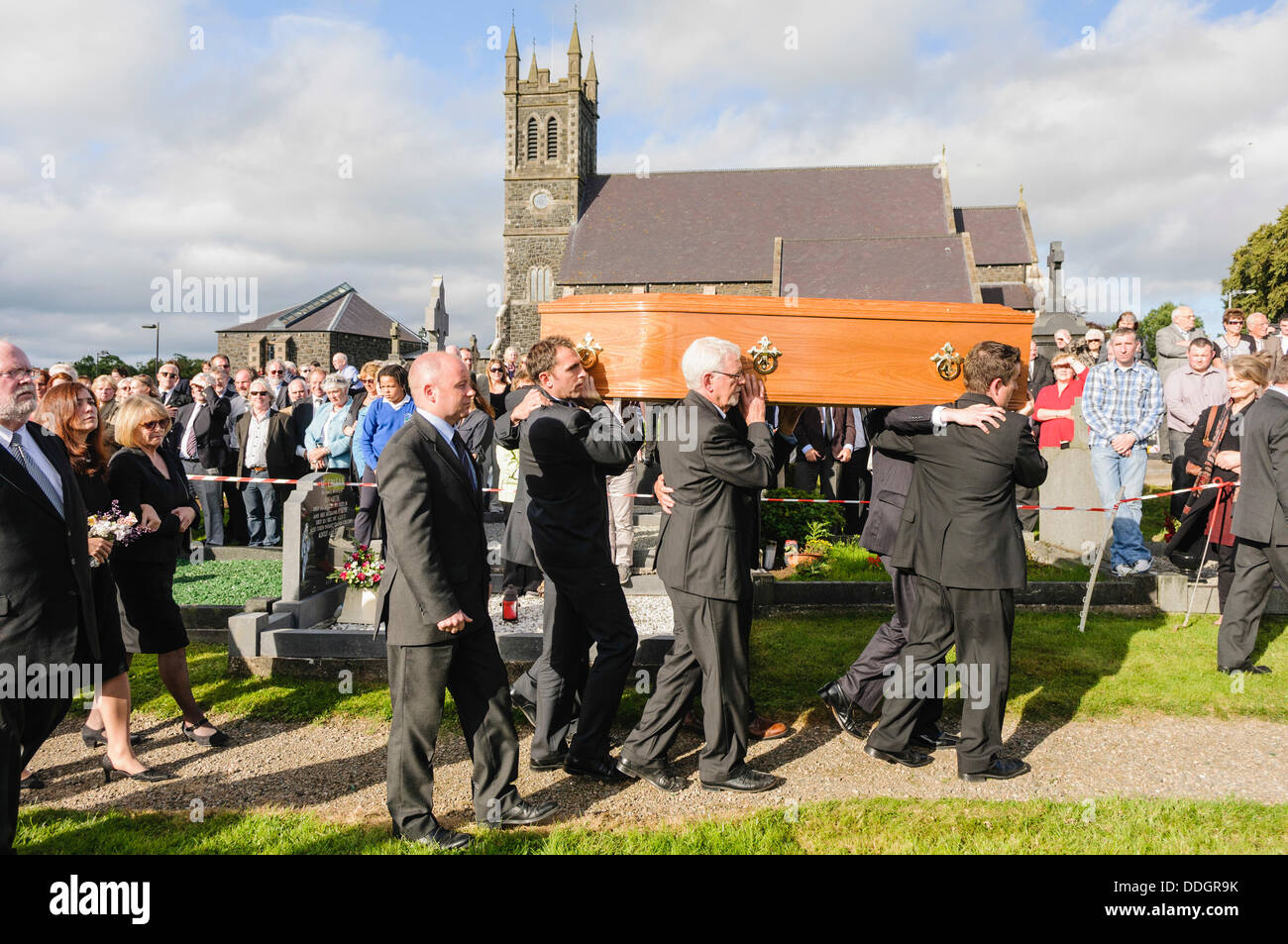 Bellaghy, Northern Ireland. 2nd September 2013 - The coffin of poet Seamus Heaney is carried through the grounds of St Mary's Church where he was laid to rest in his native town of Bellaghy. Credit:  Stephen Barnes/Alamy Live News Stock Photo