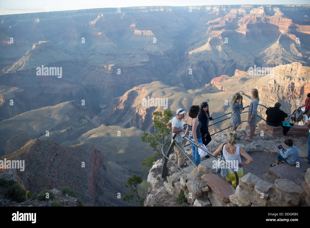 Tourists Observing Grand Canyon Stock Photo