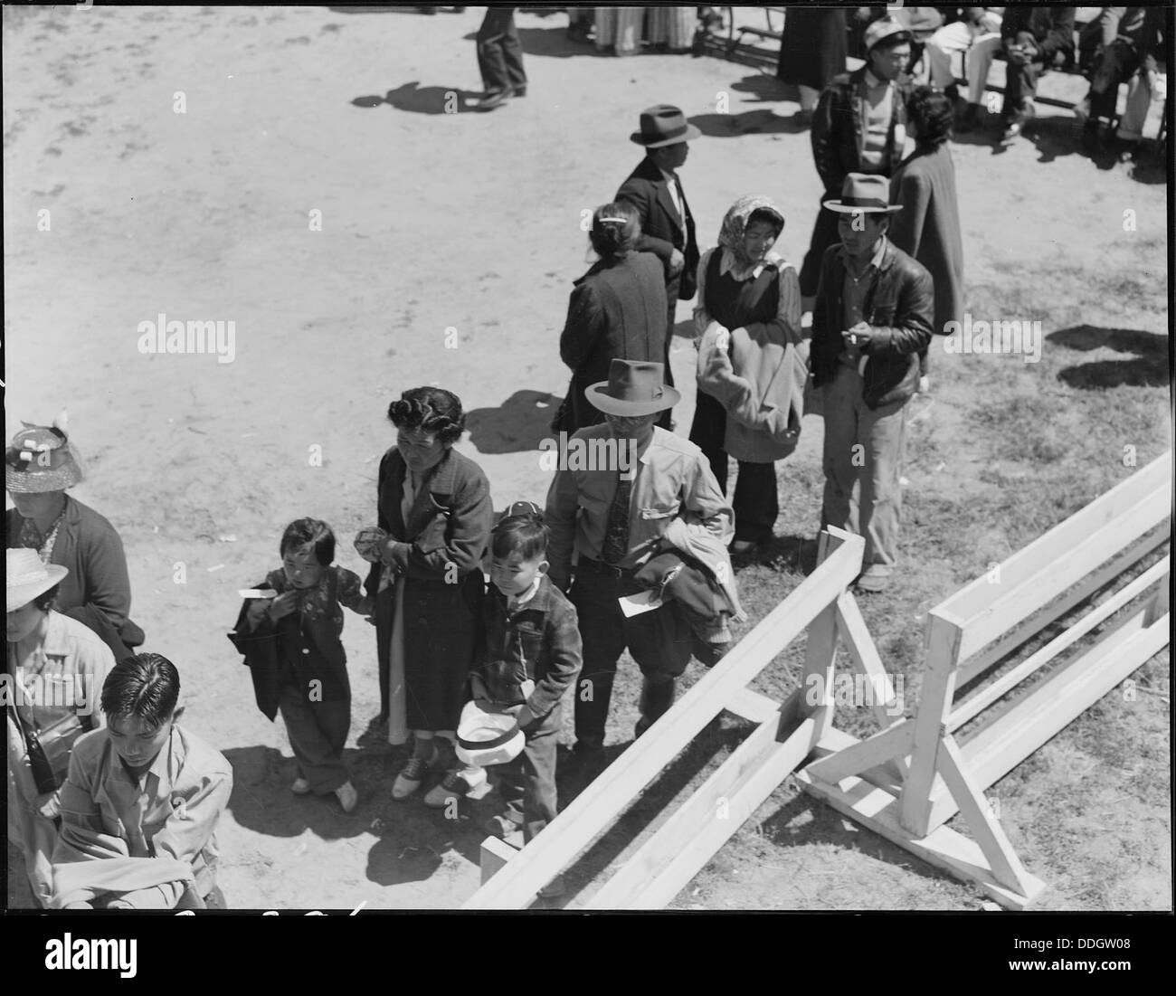 Turlock, California. These evacuees of Japanese ancestry are awaiting