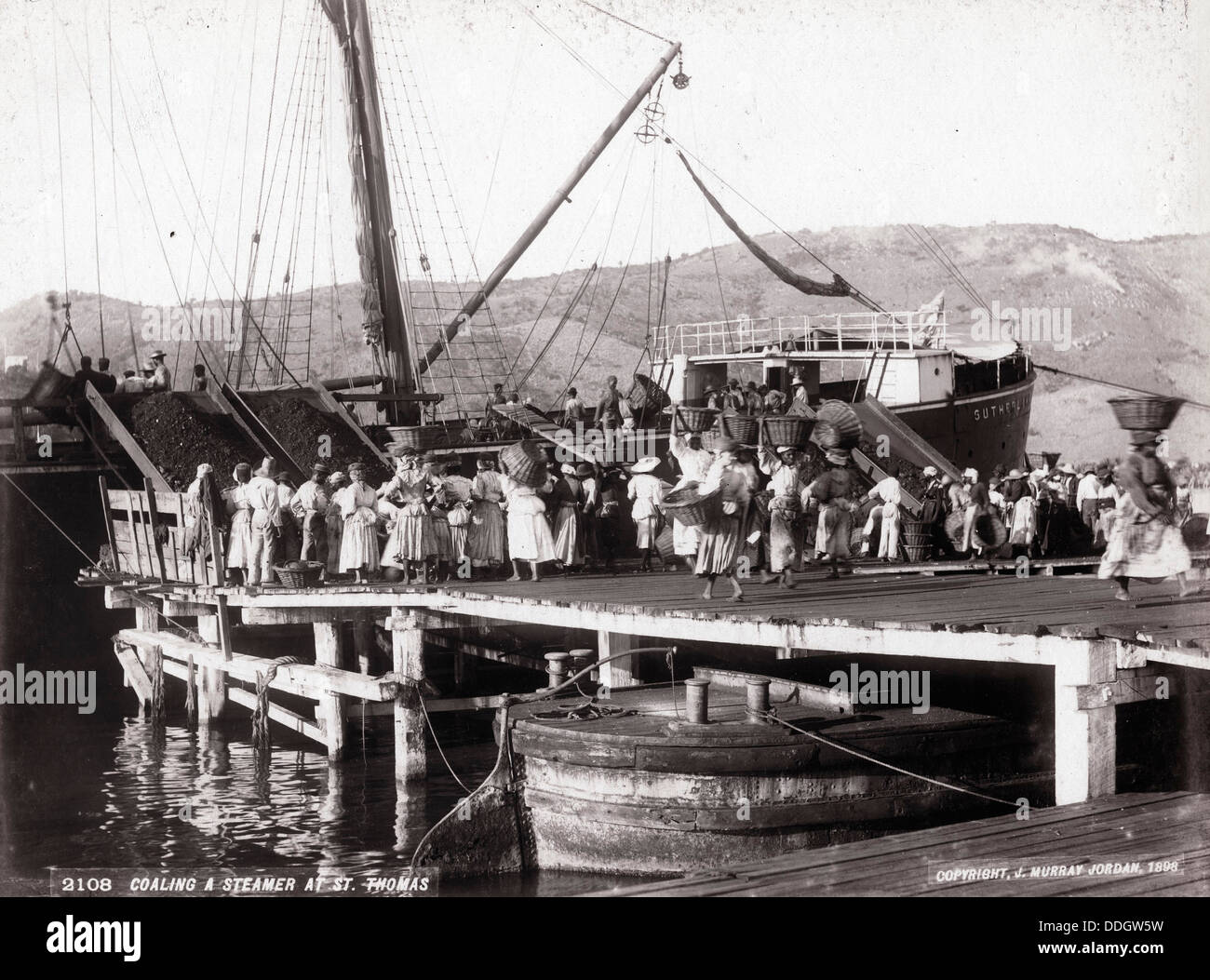 Coaling a Steamer at St Thomas, 1898, by J. Murray Jordan Stock Photo