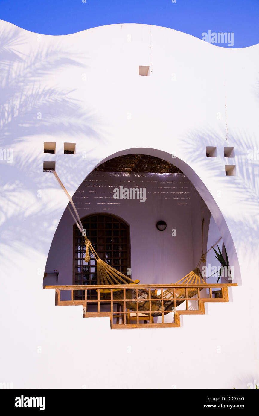 Suites at the 5-star Hilton Dahab Resort feature comfy hammocks, Dahab, Sinai Peninsula, Egypt. Stock Photo