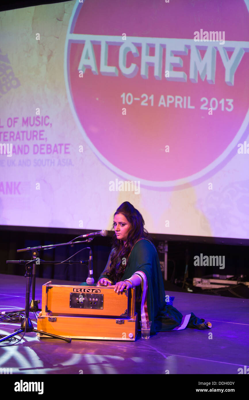 A shruti player with Ustaad Abid Hussain performing at the 2013 Alchemy Festival, Southbank Centre, London, England. UK. Stock Photo