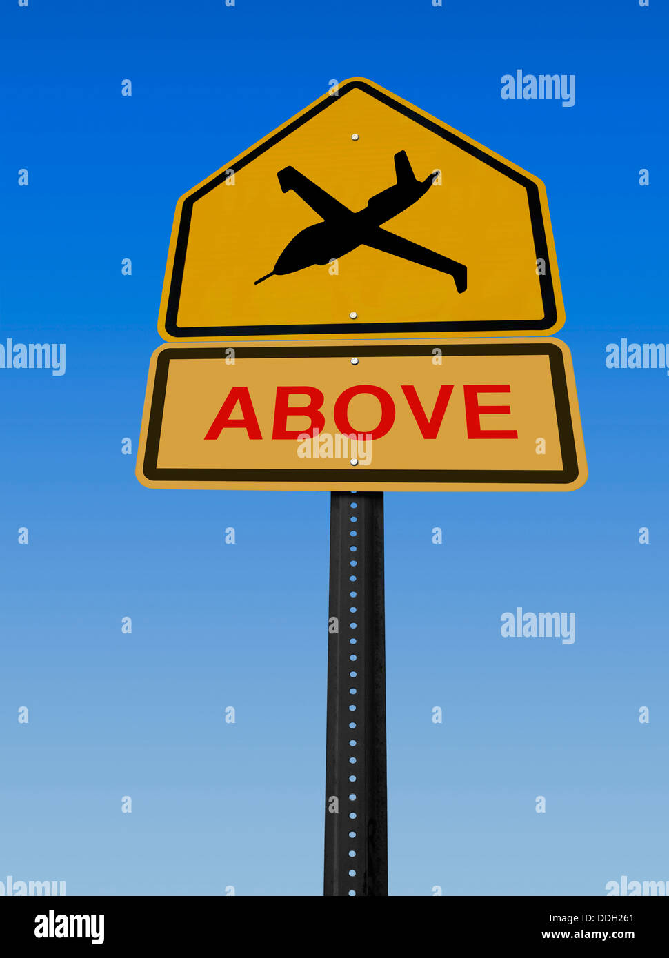 conceptual sign with drone symbol and warning above over blue sky Stock Photo