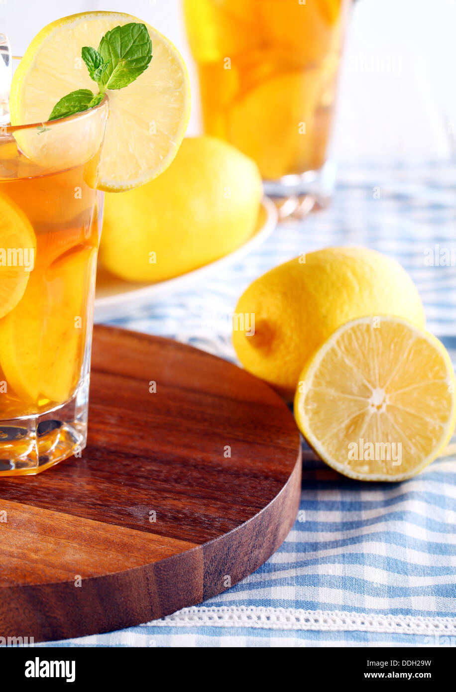Fresh and cold ice tea with sliced lemon and mint Stock Photo - Alamy