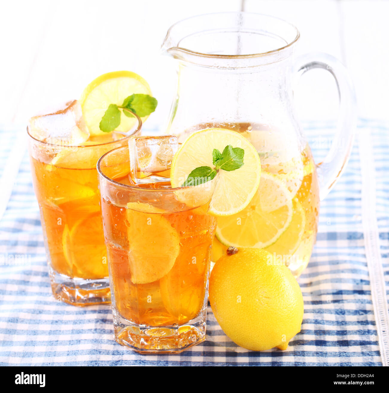 Fresh and cold ice tea with sliced lemon and mint Stock Photo - Alamy