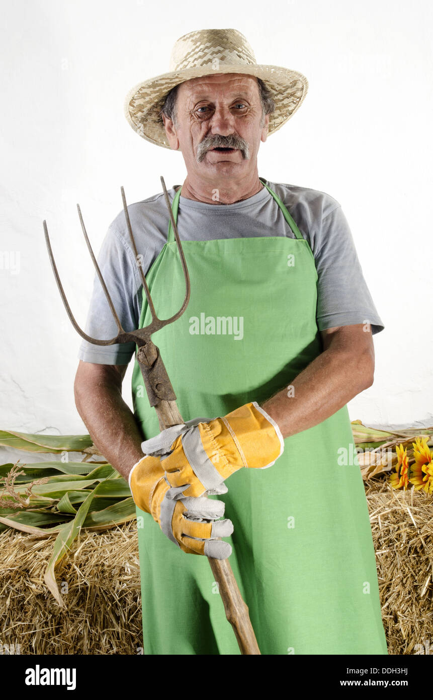 organic farmer with a pitchfork Stock Photo