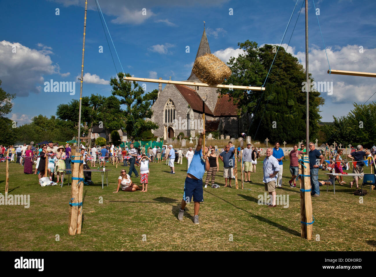 Hay Bale Tossing, The Alfriston Festival, Sussex, England Stock Photo