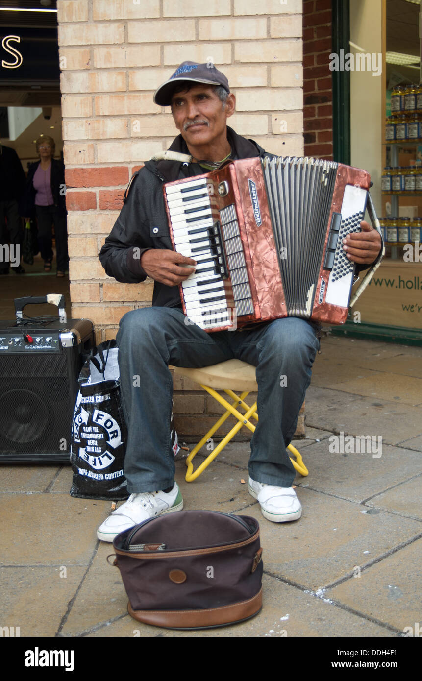 Dark skinned busker hires stock photography and images Alamy