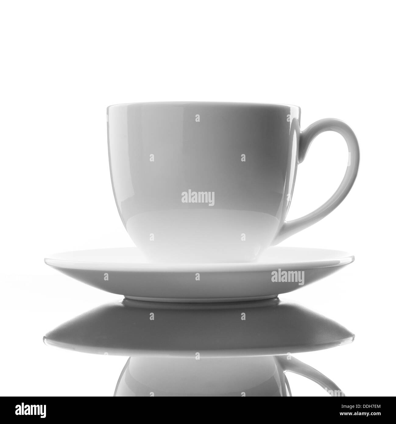 white cup and saucer on white Stock Photo