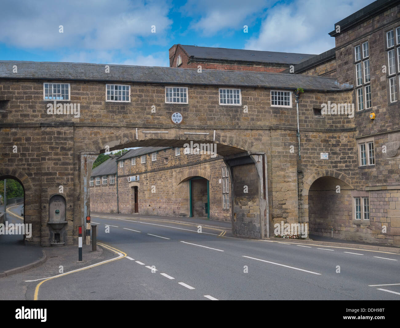 Stonen and Brick arch way next to the Belper Mill. Stock Photo