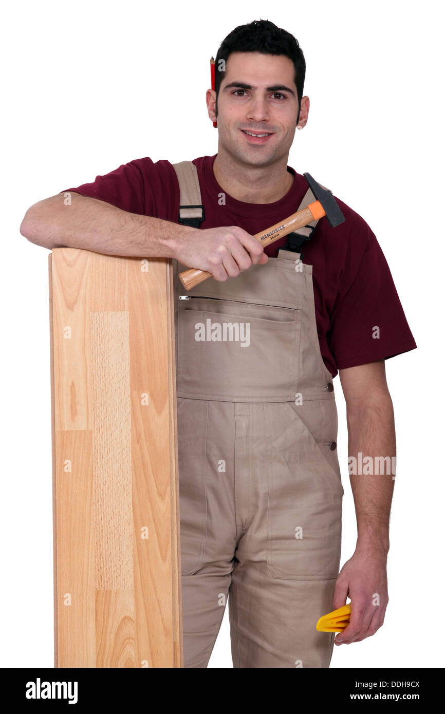 Man with laminate flooring Stock Photo