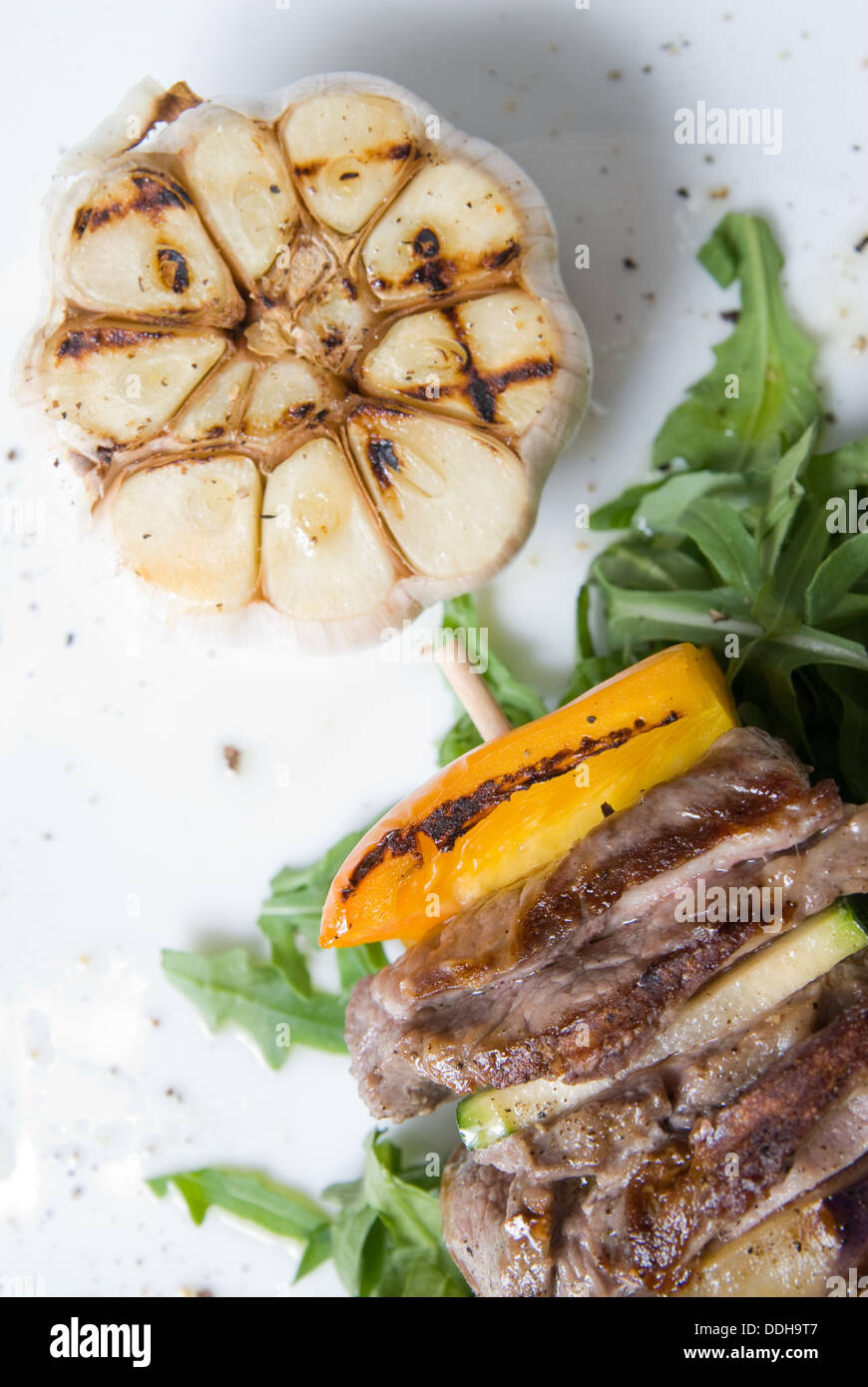shashlik with potherbs on the plate Stock Photo