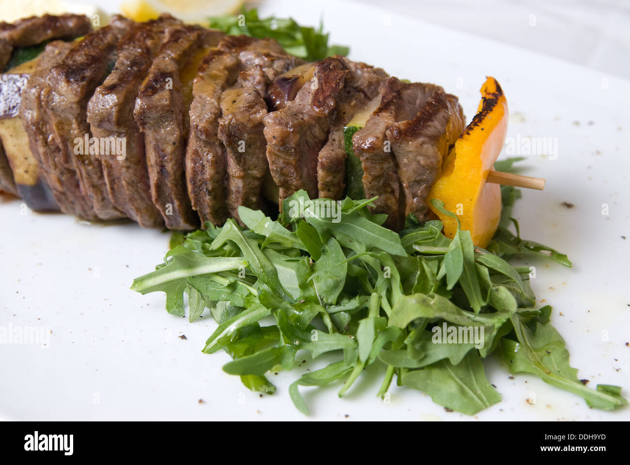 shashlik with potherbs on the plate Stock Photo