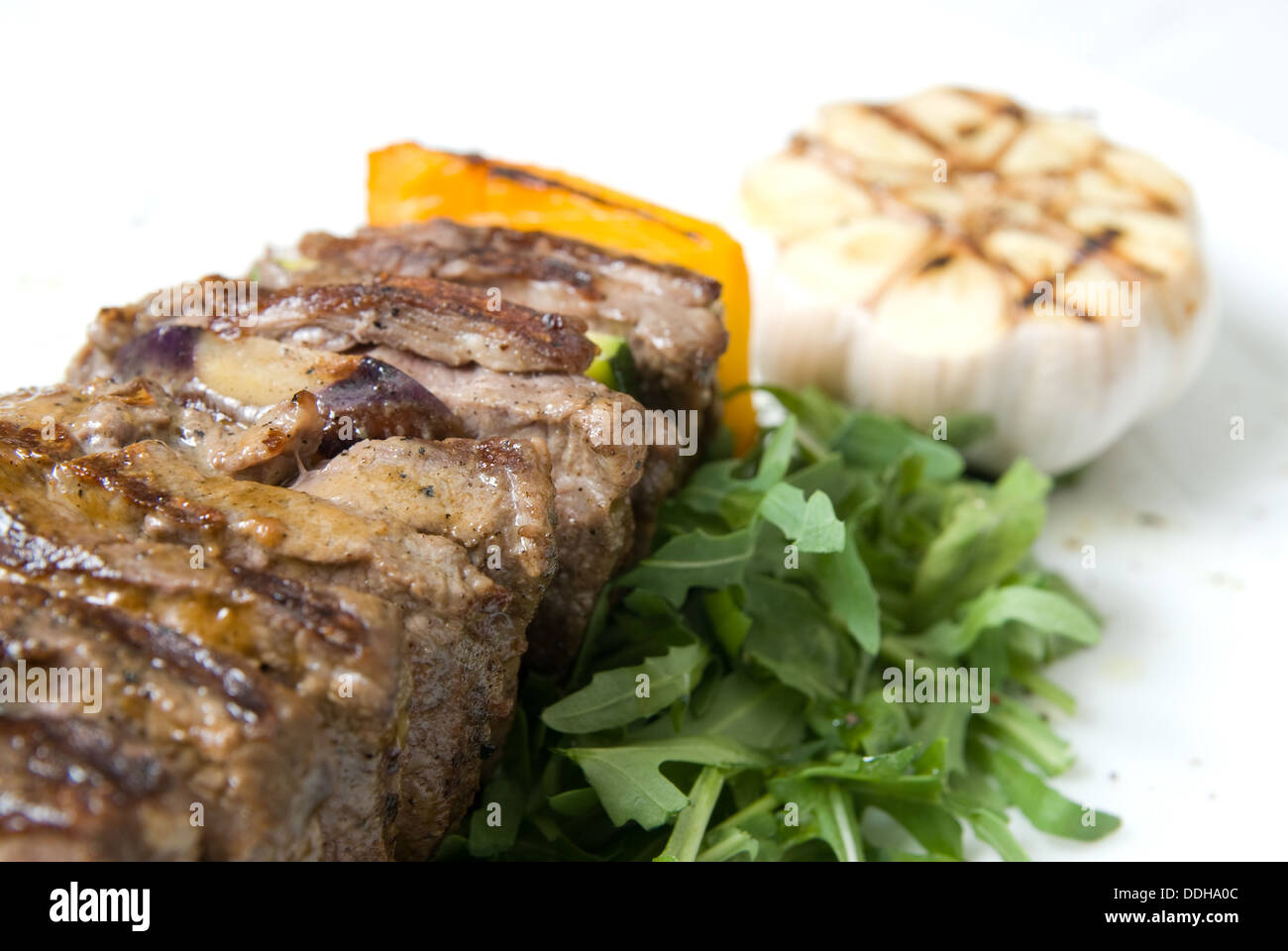 shashlik with potherbs on the plate Stock Photo