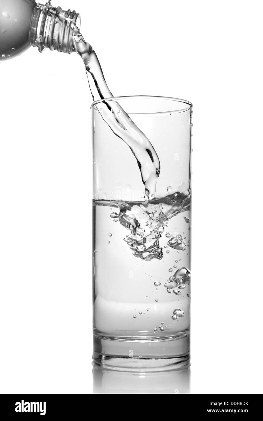 water pouring into glass from bottle isolated on white Stock Photo Alamy