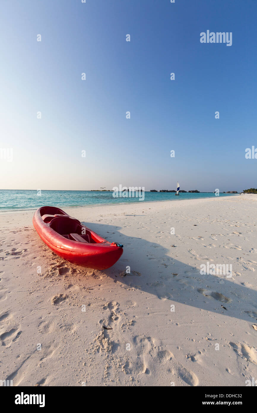 Maldives, Canoe on beach at Island Stock Photo