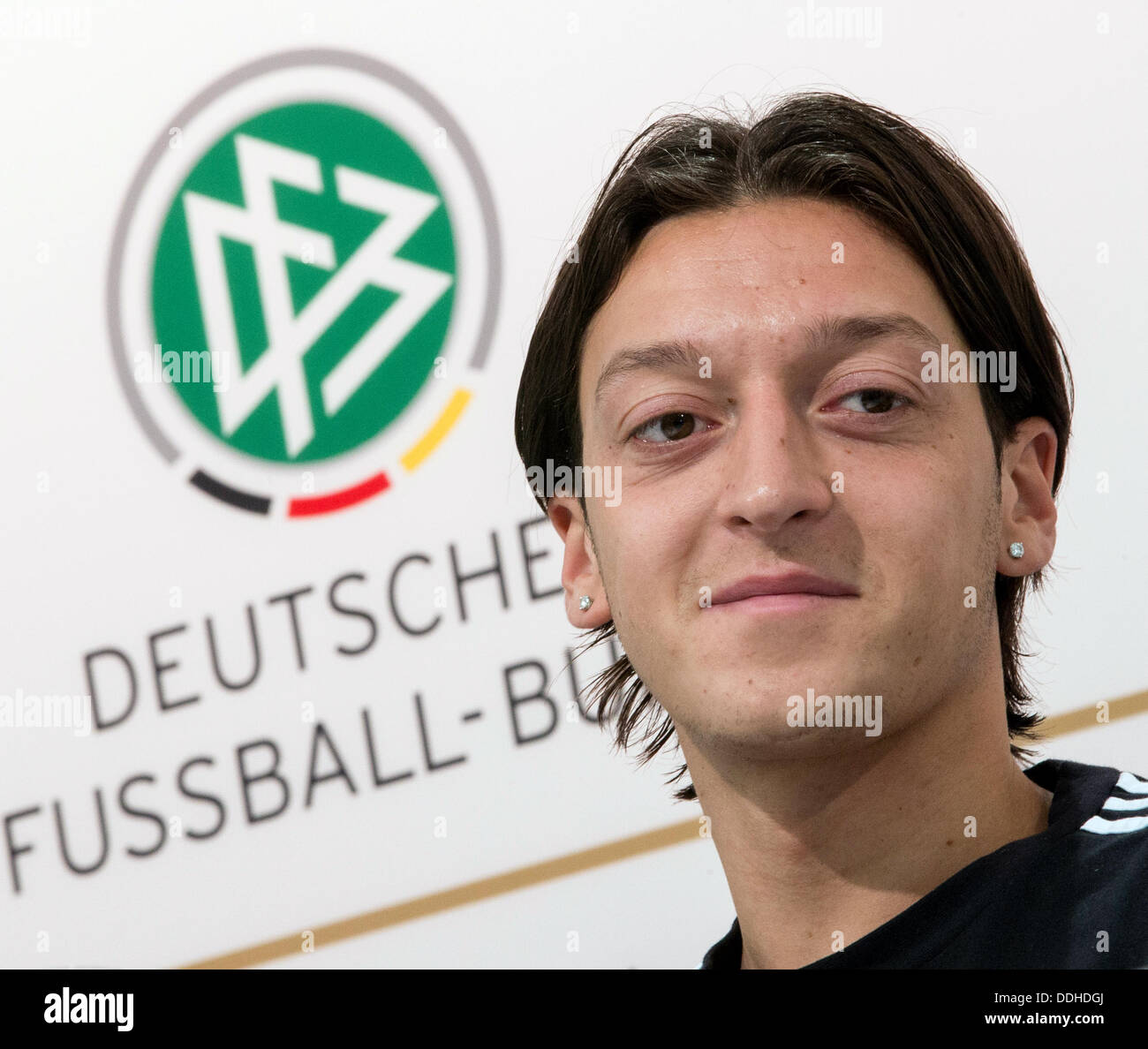 Germany's Mesut Oezil attends a press conference of the German national soccer team in Gdansk, Poland, 25 June 2012. The UEFA EURO 2012 takes place from 08 June to 01 July 2012 and is co-hosted by Poland and Ukraine. Photo: Jens Wolf dpa  +++(c) dpa - Bildfunk+++ Stock Photo