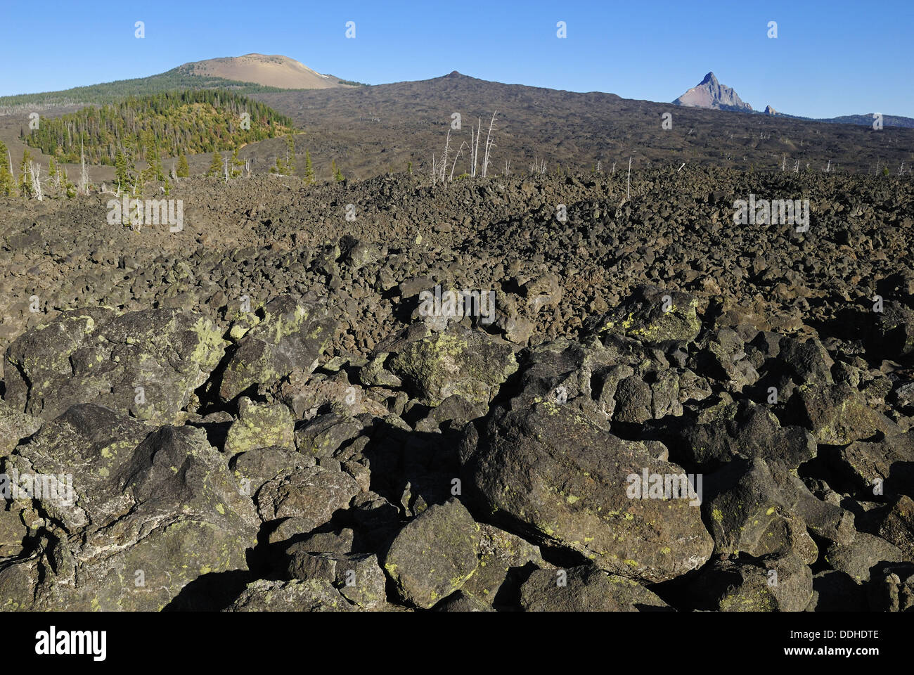 Lava landscape with Mount Washington volcanoe and Belknap Crater, McKenzie Pass, Cascade Range, Oregon, USA Stock Photo