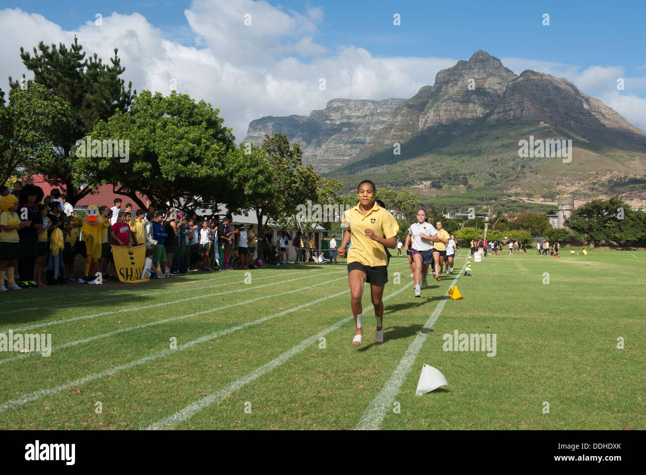 Athletic children taking part in a running competition at St. George's School, Cape Town, South Africa Stock Photo