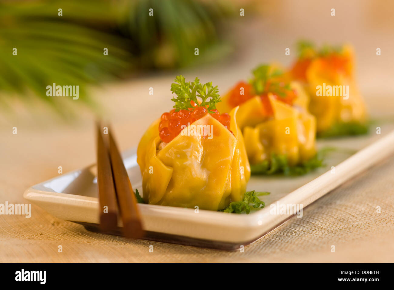 Hawaii Regional Cuisine, fine dining appetizer, shumai, fish roe Stock