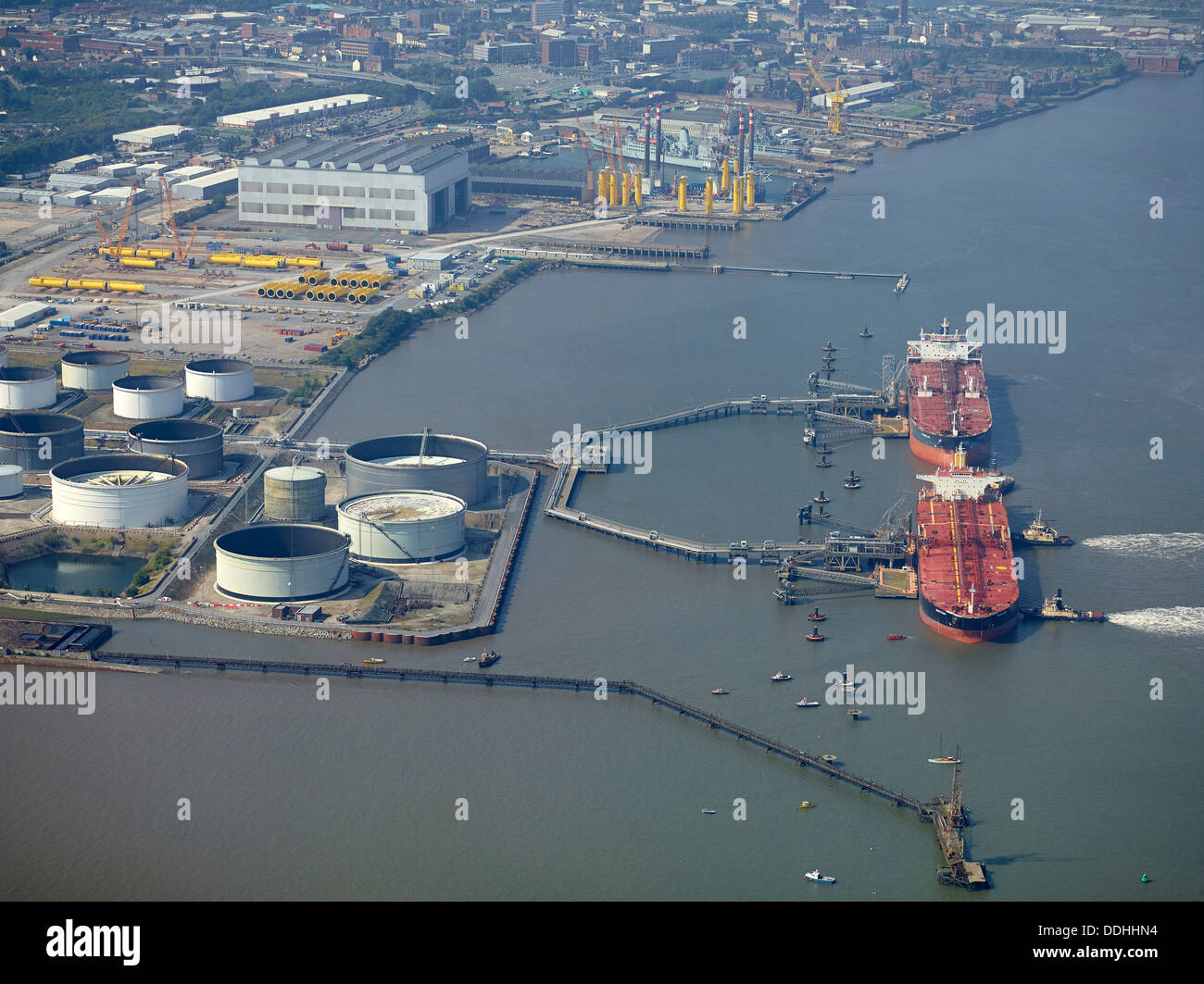 Oil tankers unloading at Birkenhead on the river Mersey, Liverpool, NW England, UK Stock Photo