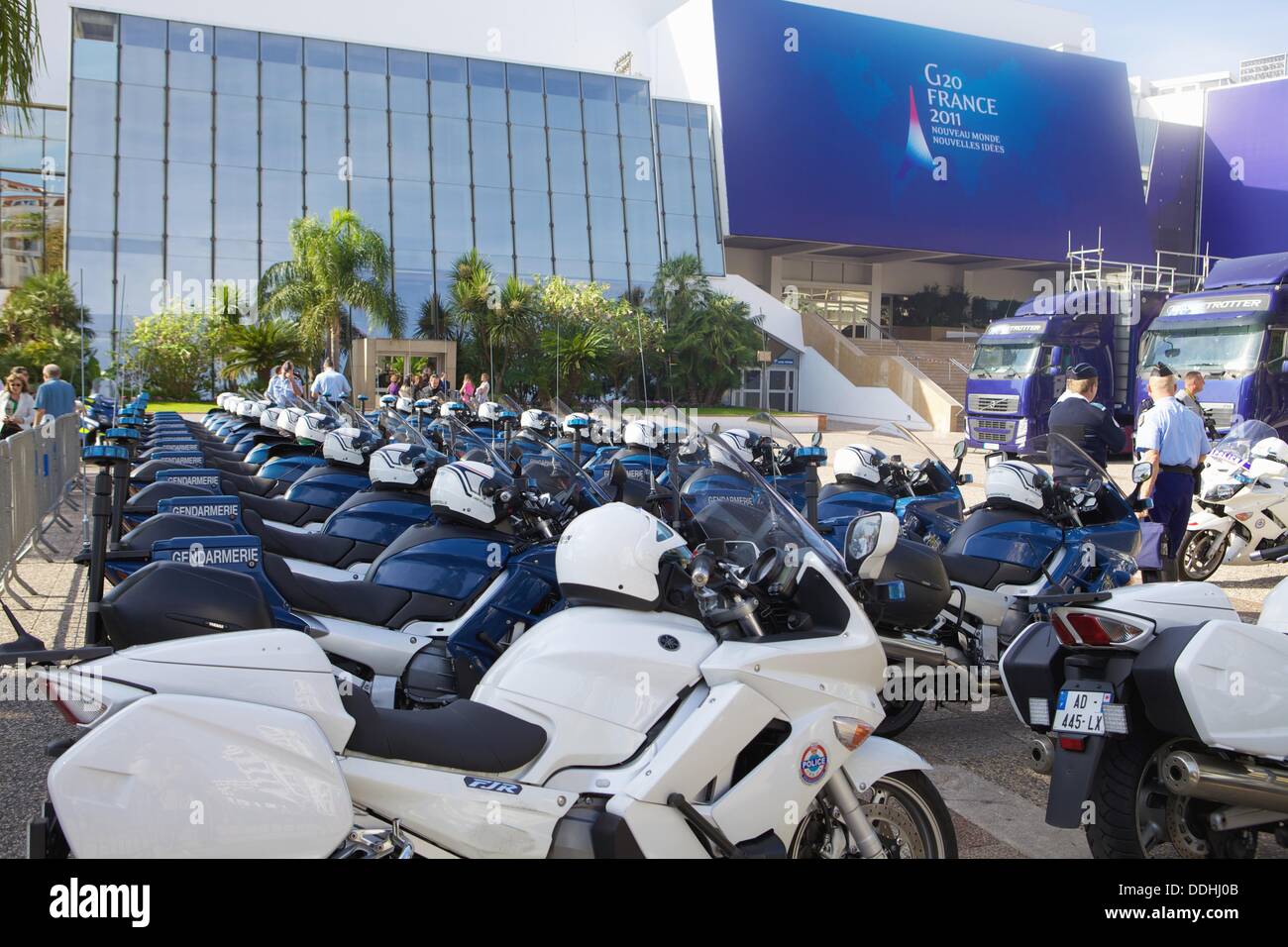 The Cannes Palais des Festival before the 2011 G-20 summit, with police forces parked next to the entrance Stock Photo