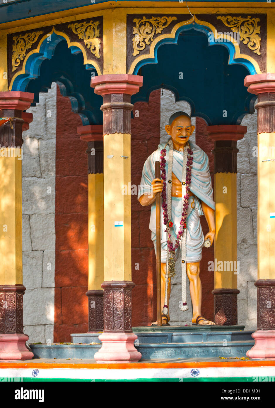 Representation of Mahatma Gandhi with walking stick in a small pavilion on the temple wall, Meenakshi Amman Temple or Sri Stock Photo
