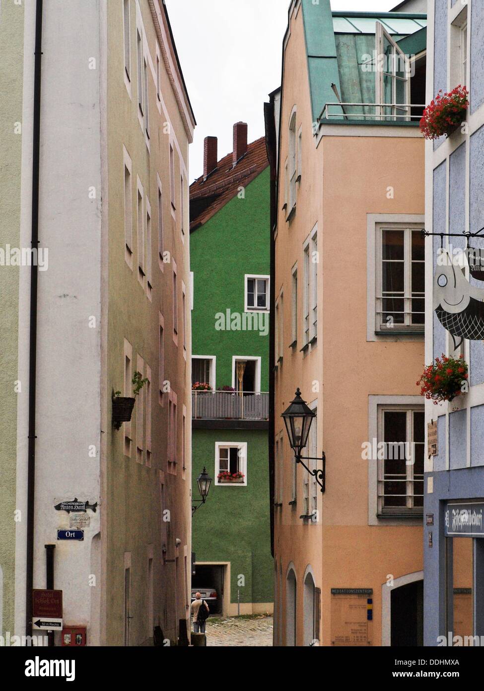 Apartment buildings on a narrow cobblestone street Passau, Germany