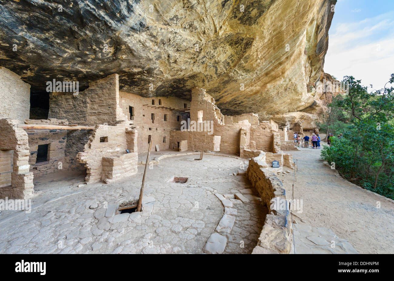 Tourists at Spruce Tree House ruins, ancient Anasazi pueblo dwellings ...