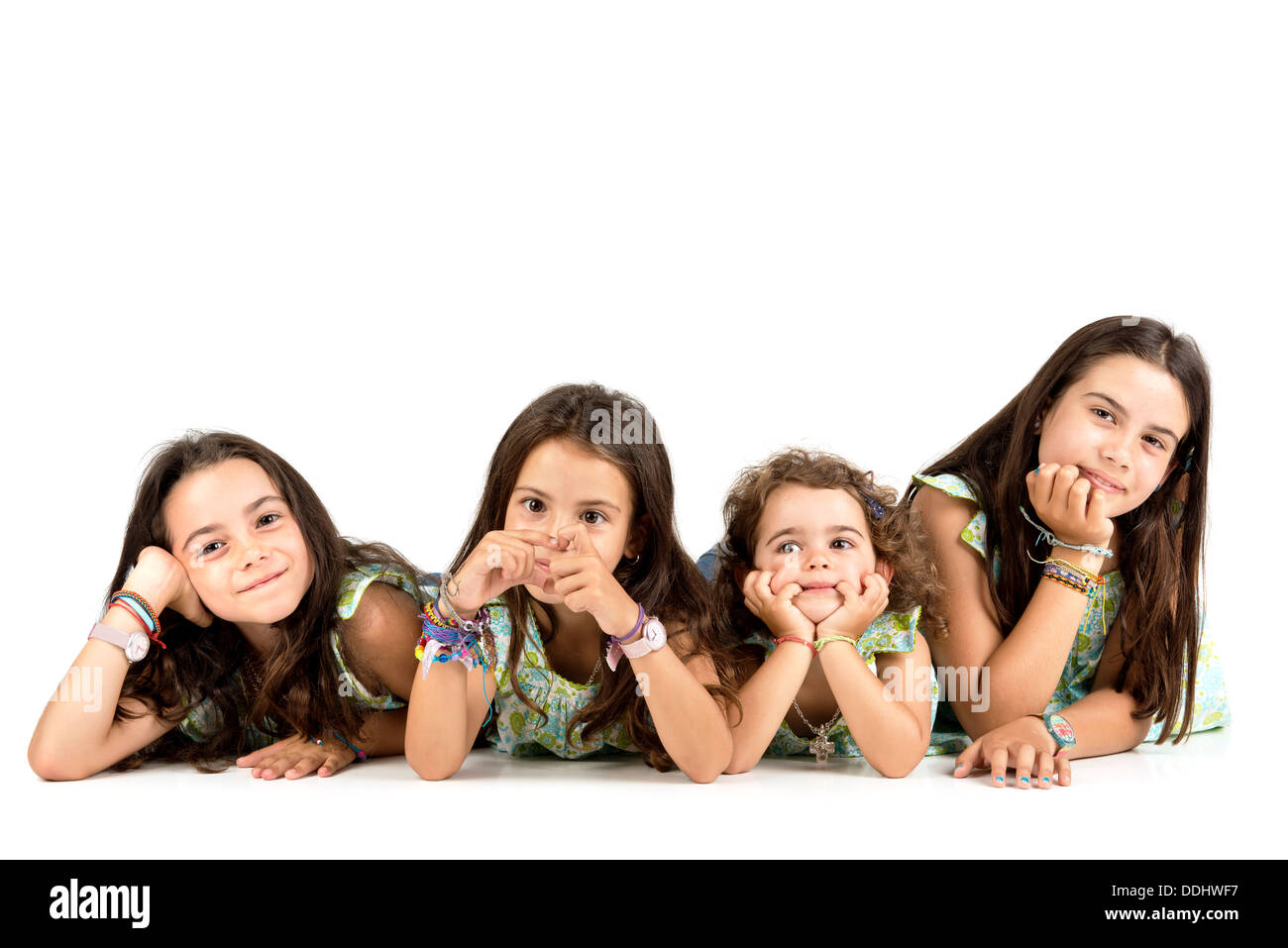 Group of young girls posing isolated Stock Photo - Alamy