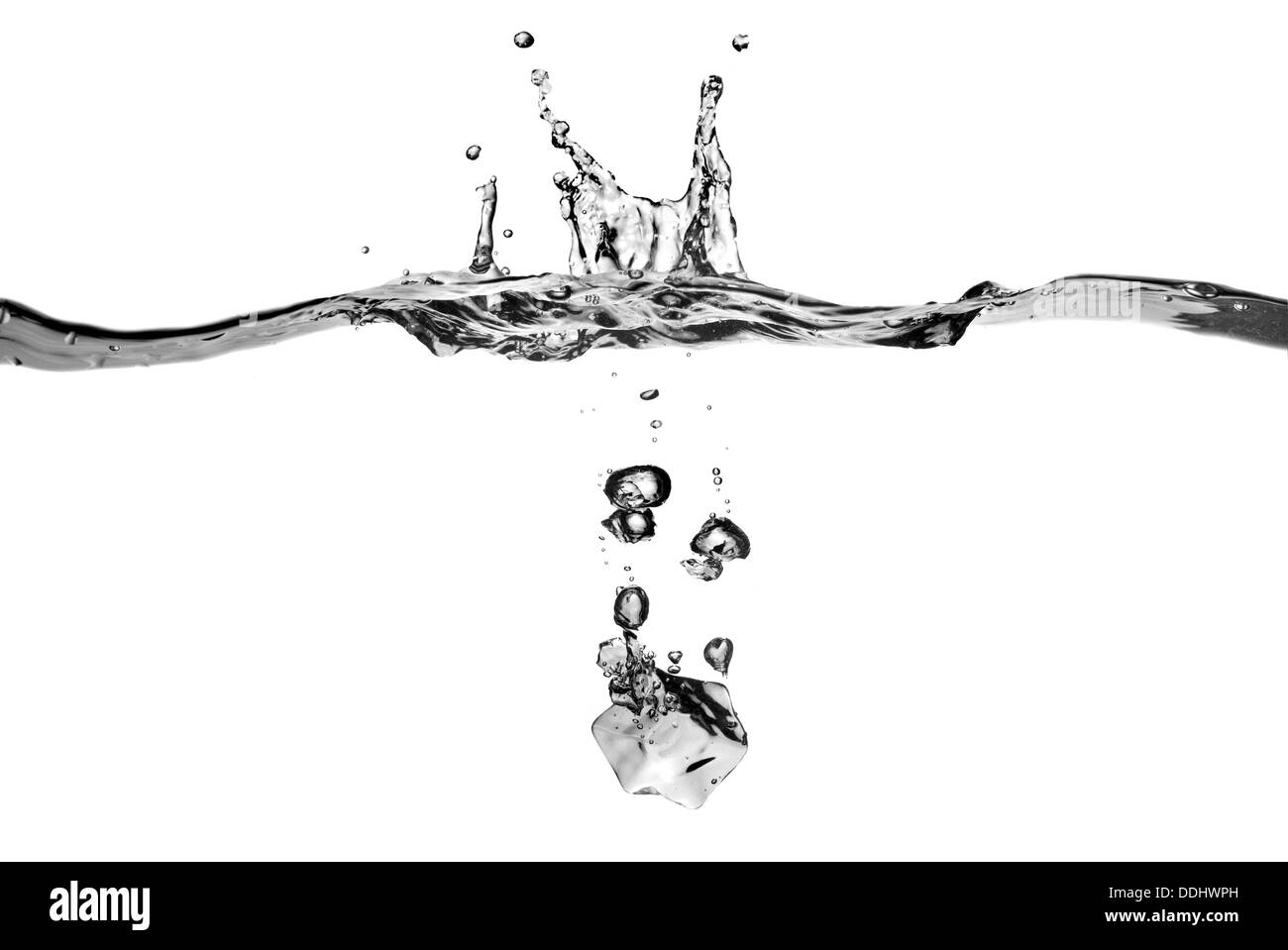 ice cube dropped into water with splash isolated on white Stock Photo ...