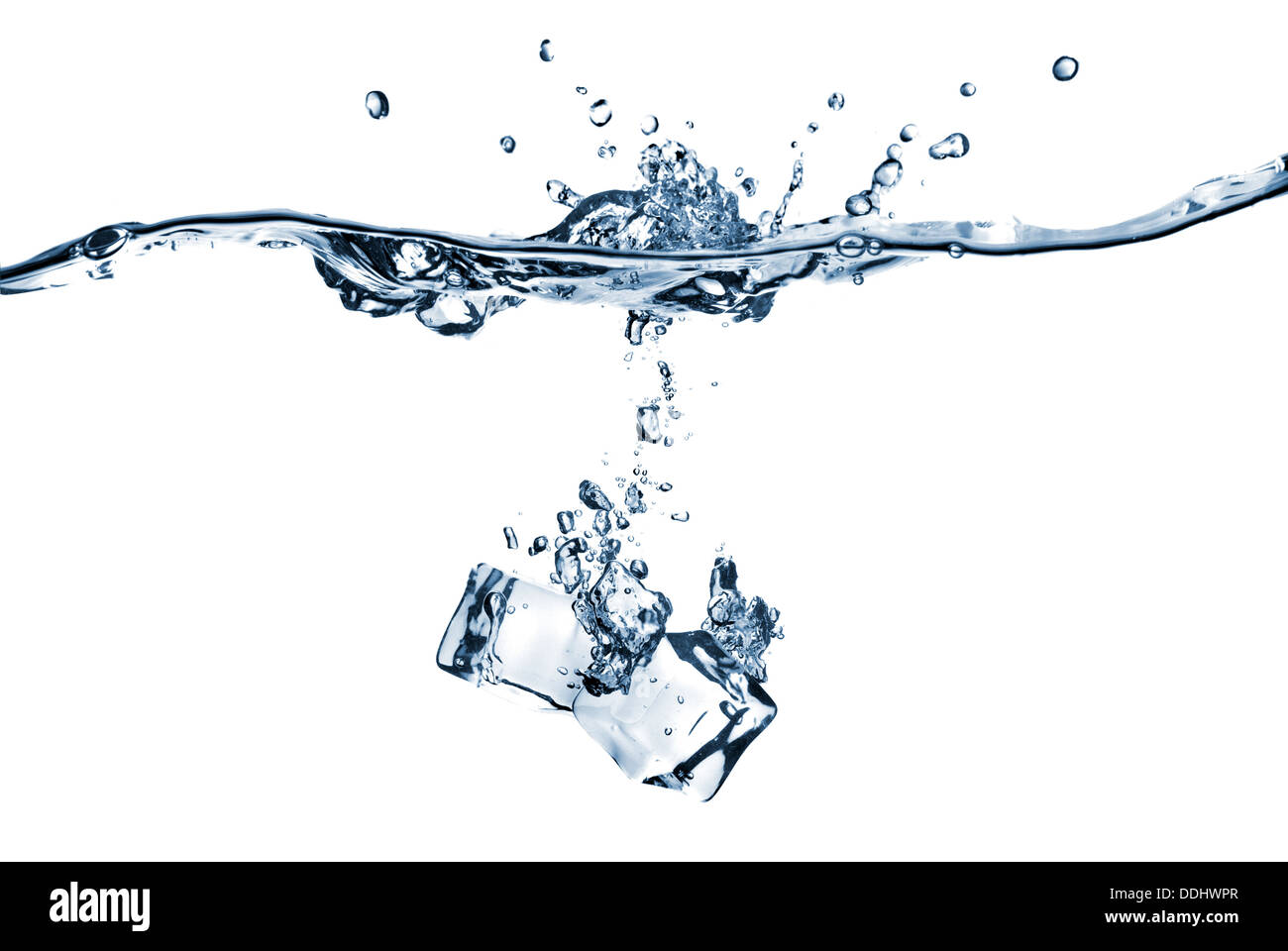 ice cubes dropped into water with splash isolated on white Stock Photo ...