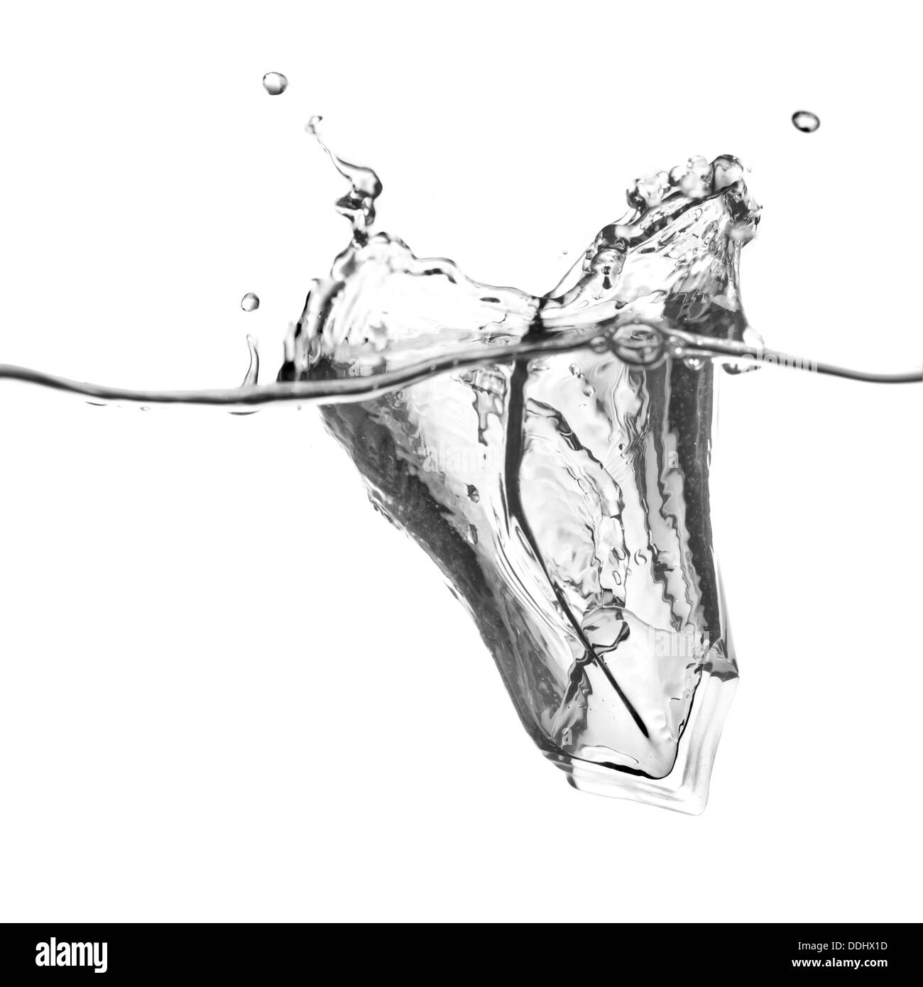ice cube dropped into water with splash isolated on white Stock Photo ...