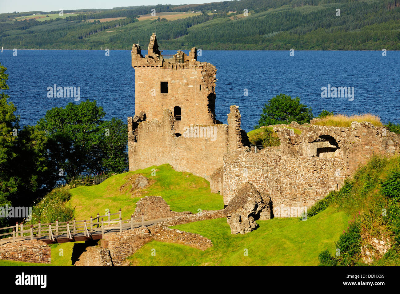 Ruined castle, Grant Tower and walls of Urquhart Castle at Loch Ness Stock Photo