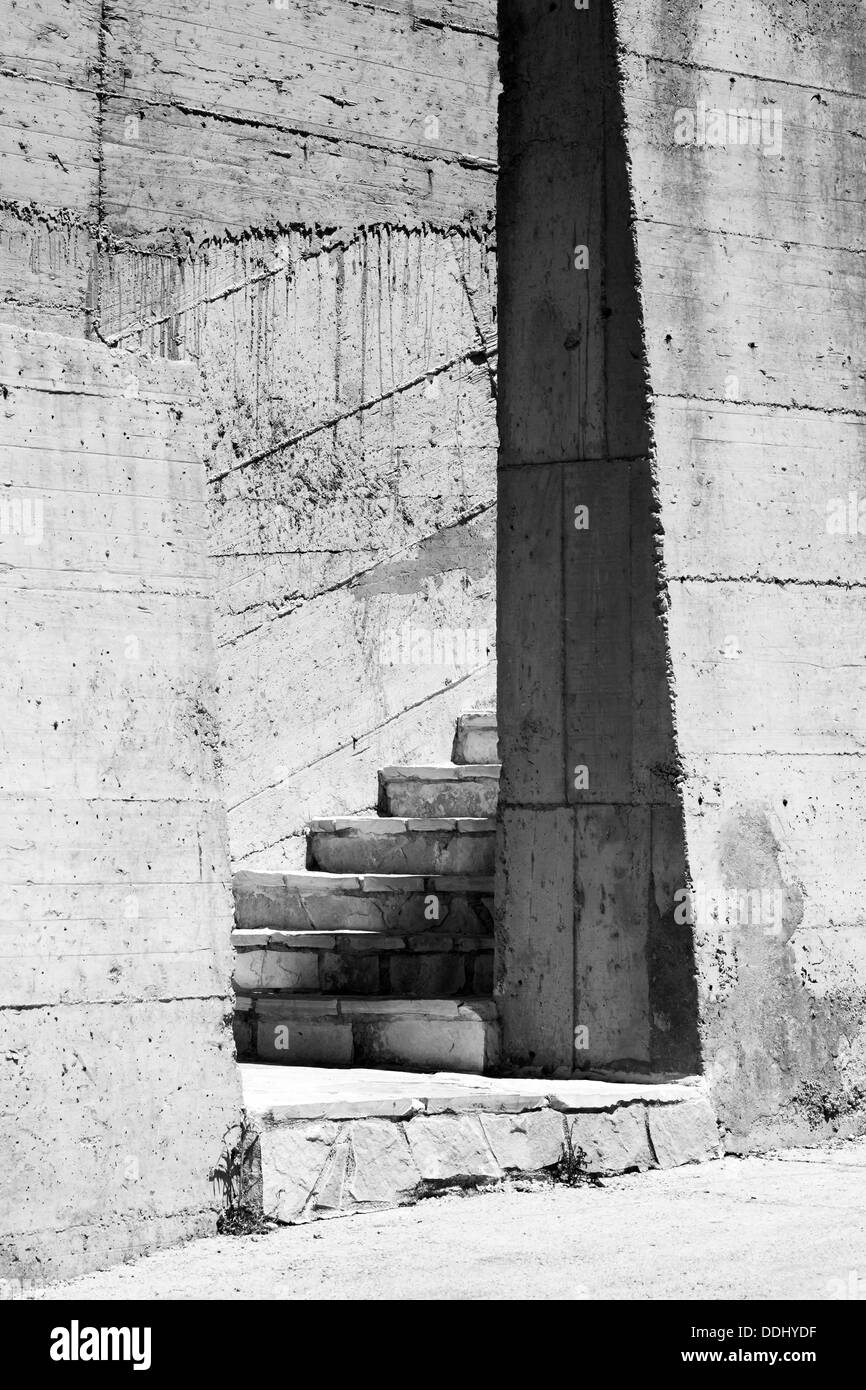 Abstract industrial architecture fragment with gray concrete walls and stairs Stock Photo
